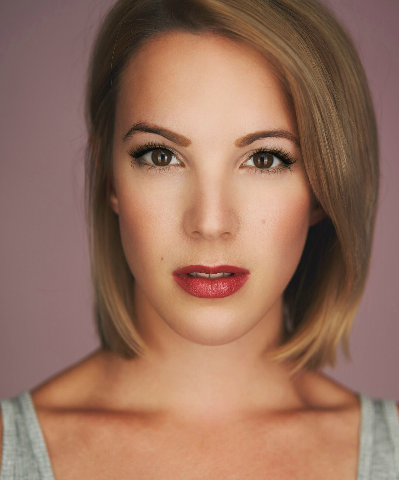 Susanne Burgess Headshot Pink close.jpeg